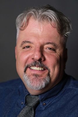 Portrait of Byron Scheuer, Associate.