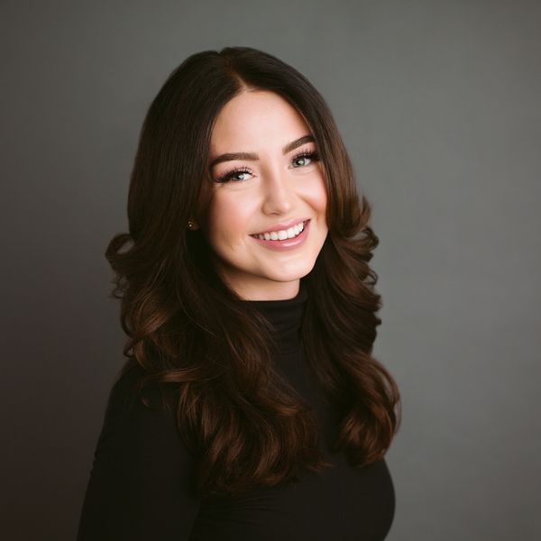 Mikela Blundon, Associate